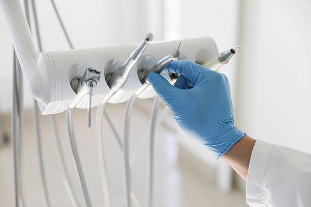 Professional Tooth Extraction technician working in Clayton, NC